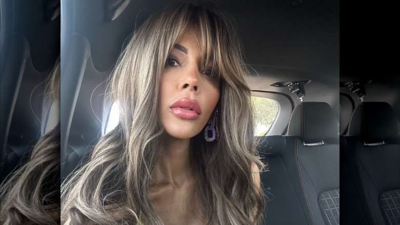 Jasmine Pineda wearing an ash blond wig