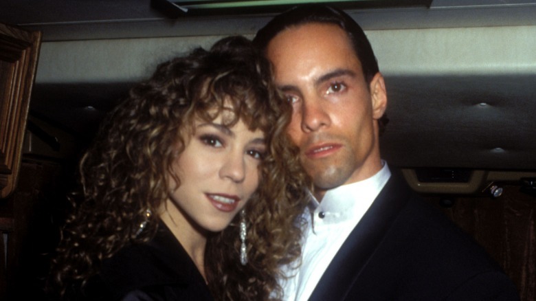 Mariah Carey posing with her brother Morgan.