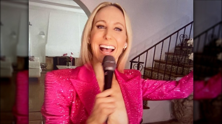 Screenshot of Nikki Glaser greeting Jimmy Fallon on