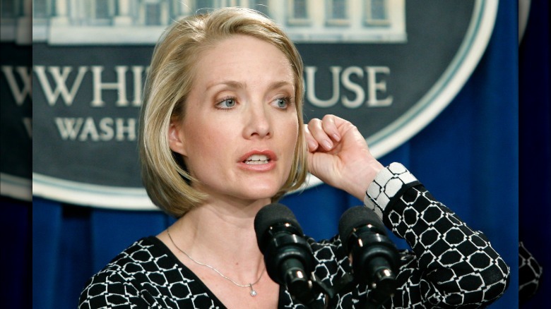 Dana Perino speaking to the media in the White House press briefing room.