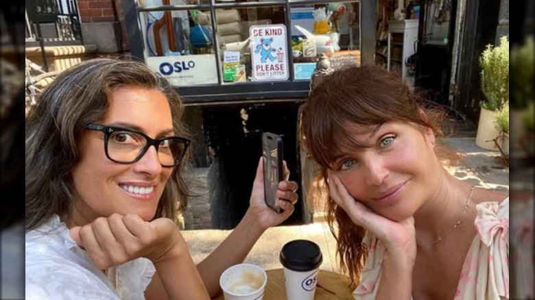Yasmeen Ghauri and Helena Christensen pose for a selfie in 2022